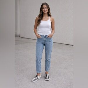 Vans Checkerboard Slip-On Sneakers in Black & Cream